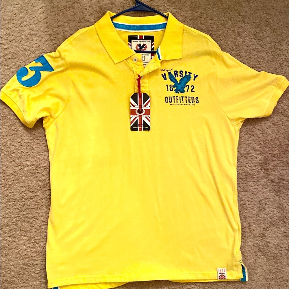 Never worn polo. Varsity club.